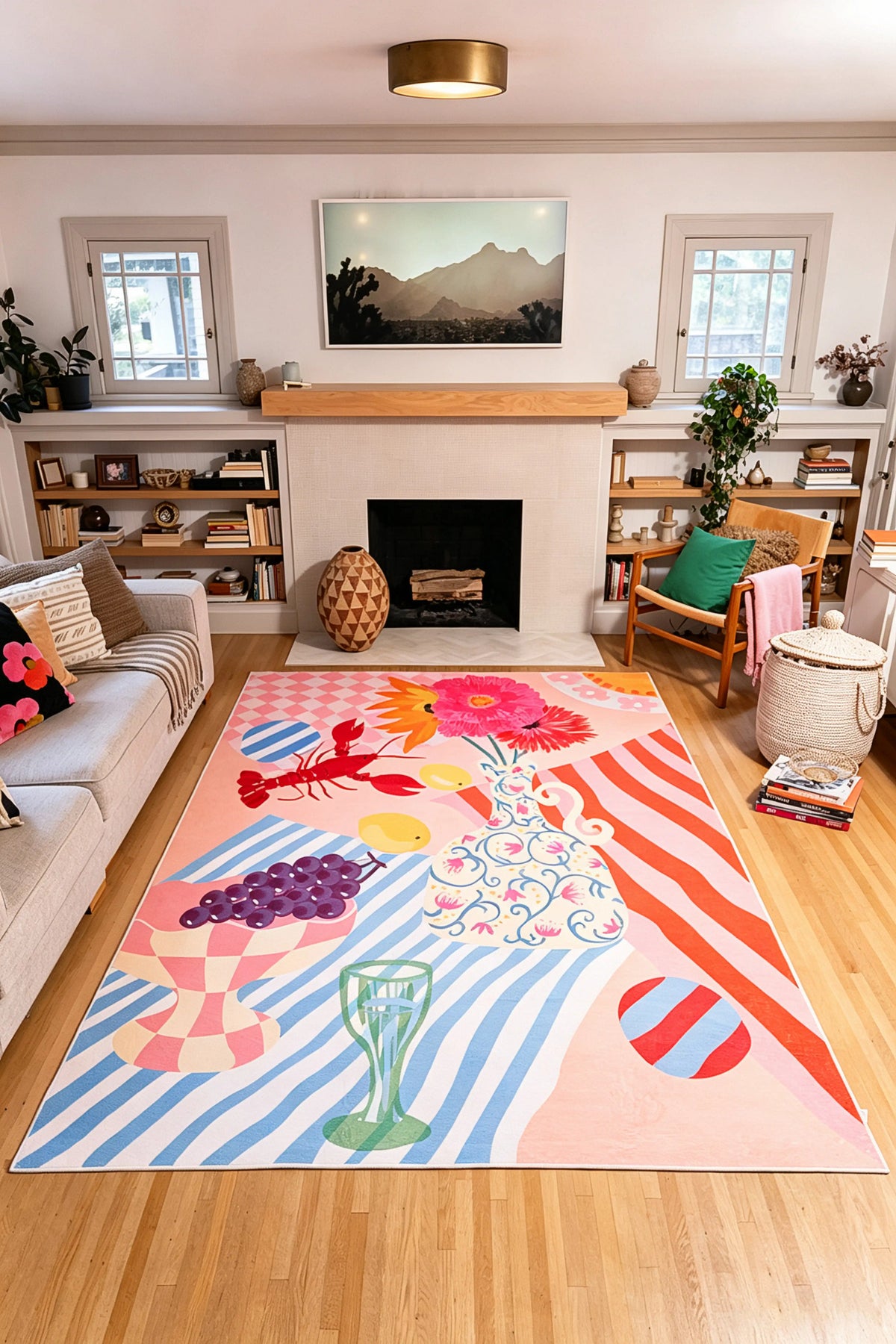7' × 10' Colorful Summer Picnic Rug by Qiao Yu with striped panels, flowers, grapes, lemons, and a red lobster on a wood floor.