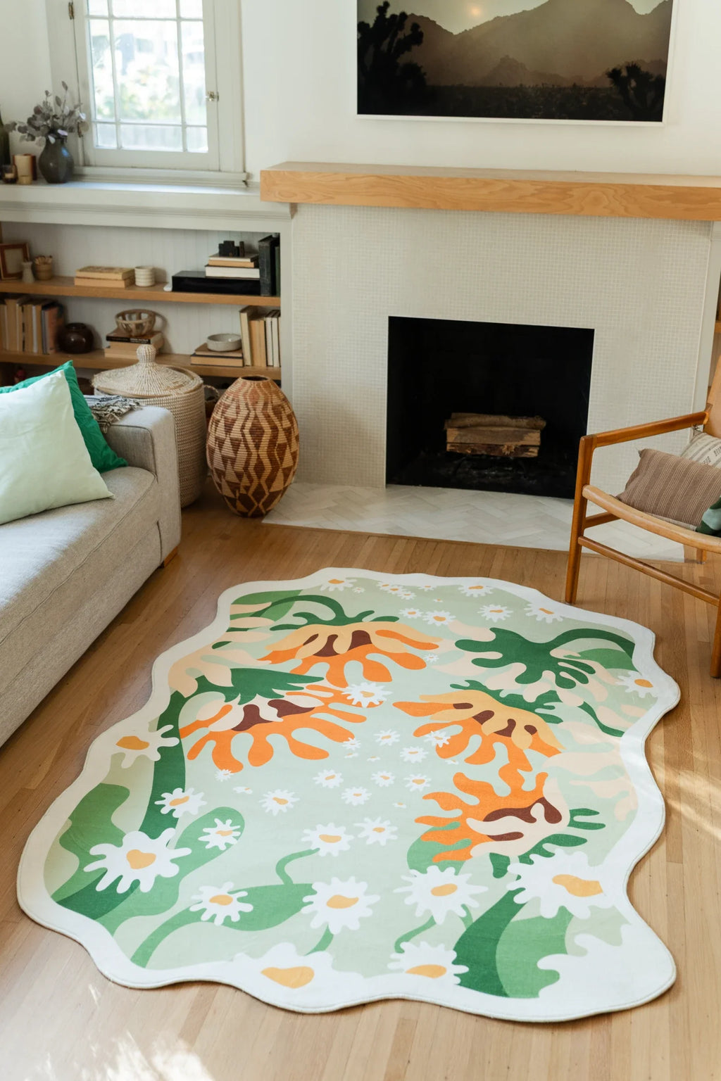 Sunflower inspired area rug near the fireplace and sofa, with flowing green leaf forms on a pale mint background