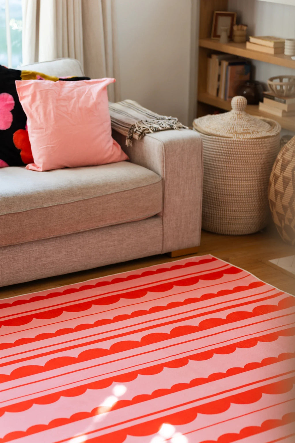 Orange and Pink Scalloped Striped Rug by Becca Franks