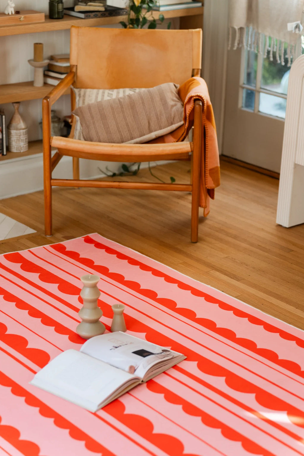 Orange and Pink Scalloped Striped Rug by Becca Franks