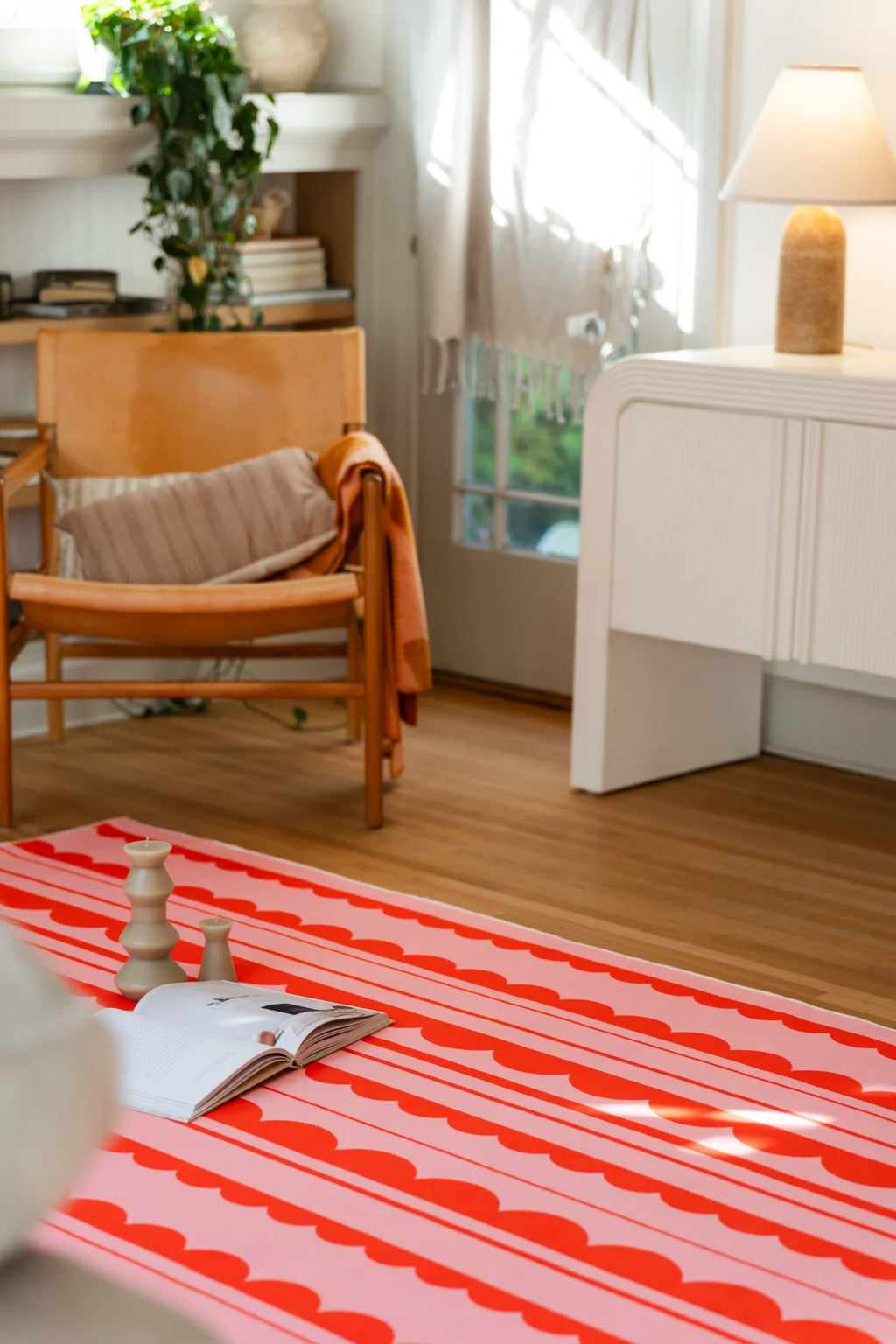 Orange and Pink Scalloped Striped Rug by Becca Franks