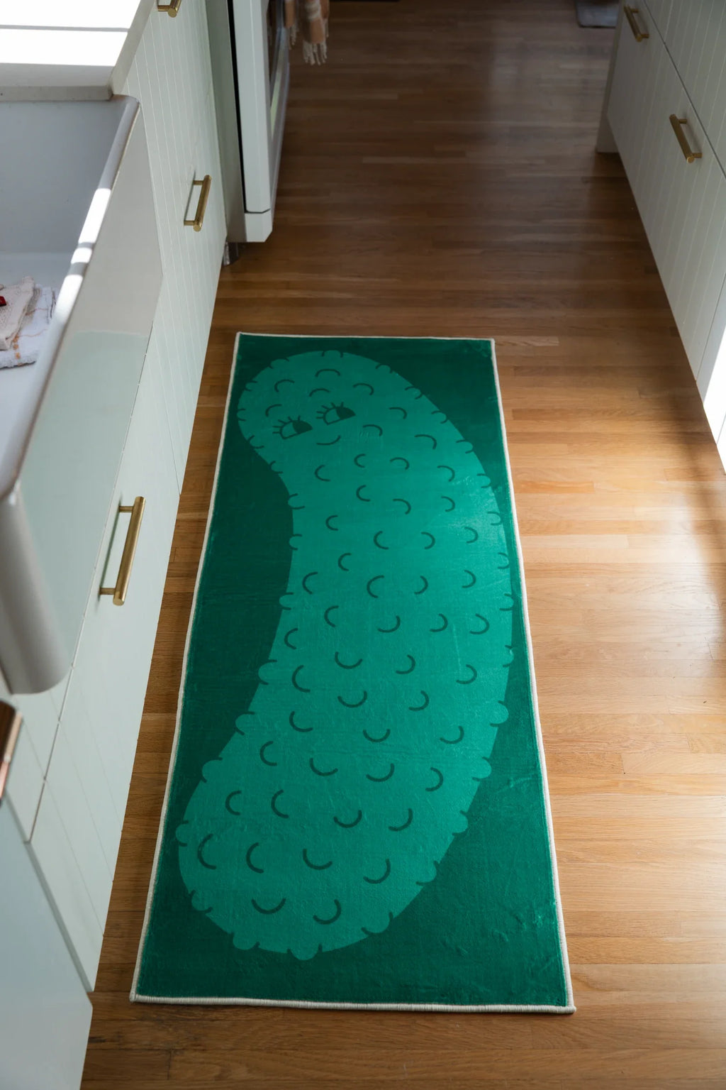 Green Cartoon Pickle Runner Rug by Becca Franks