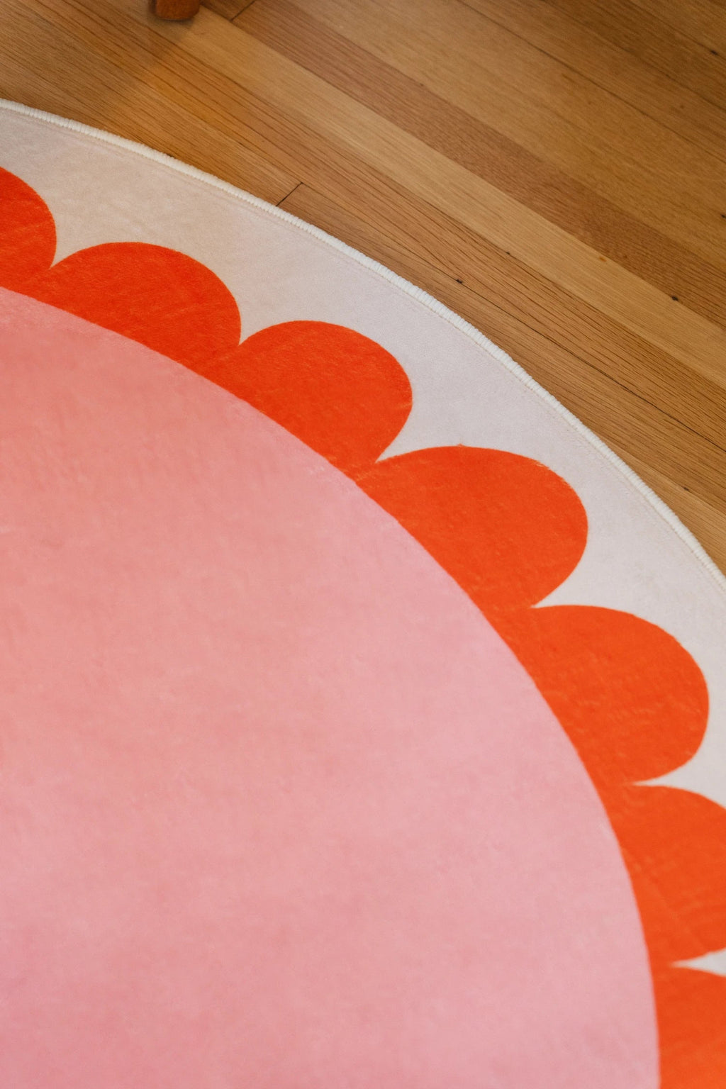 Pink and Orange Scalloped Round Rug by Becca Franks