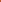 Close-up of black-outlined red and cream loops on a bright orange rug beside wooden furniture.