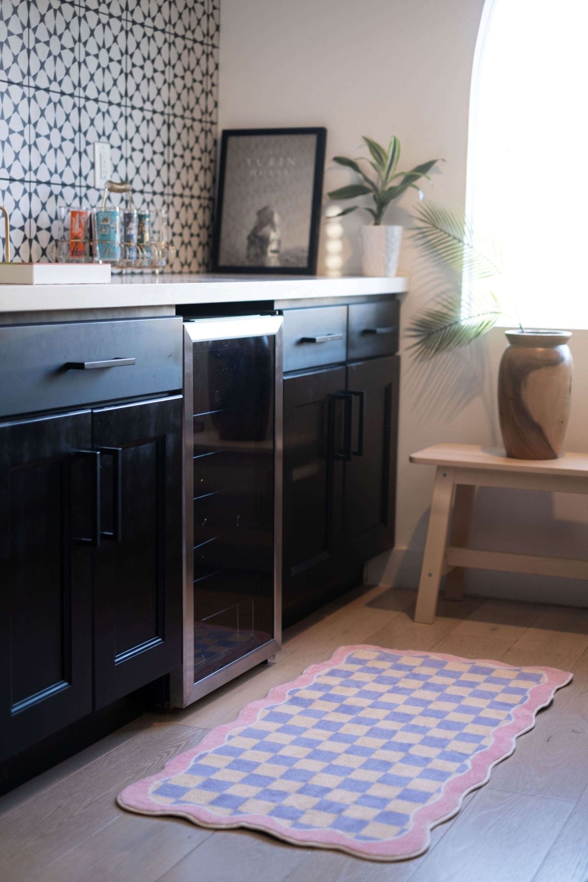 Mellow Pastel Runner placed in a modern black cabinet kitchen, paired with wood tones and minimal decor.