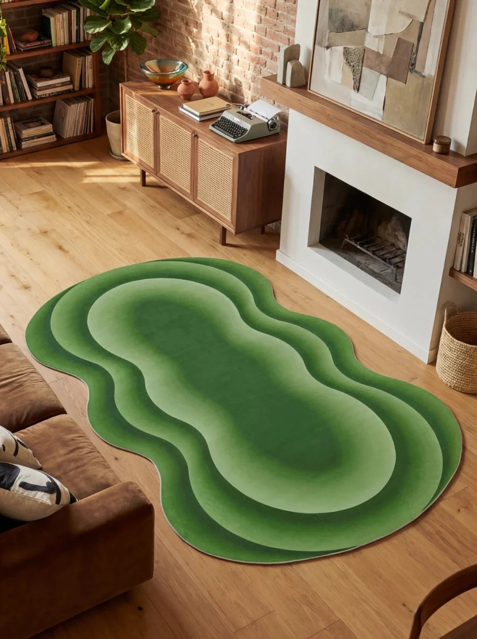 Green wavy area rug in a warm living room beside a brown sofa, white fireplace, and low wood cabinet