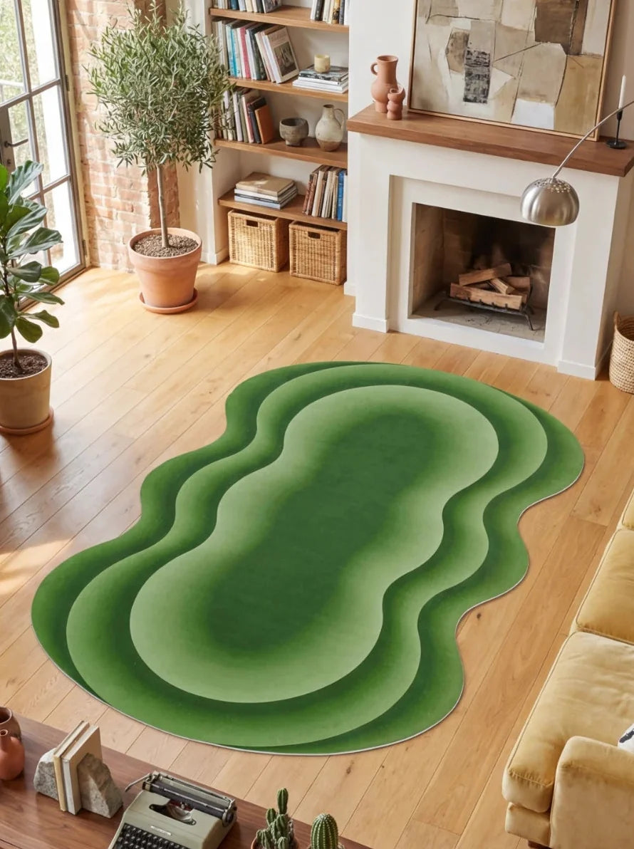 Green Modern Abstract Wavy Area Rug by Juan Marquez in a bright living room with a white fireplace and wood shelves